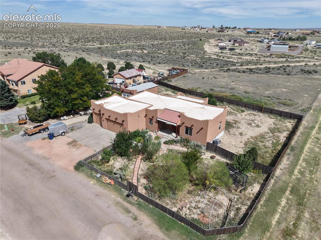Image 49 of 50: Full view of the home and land.