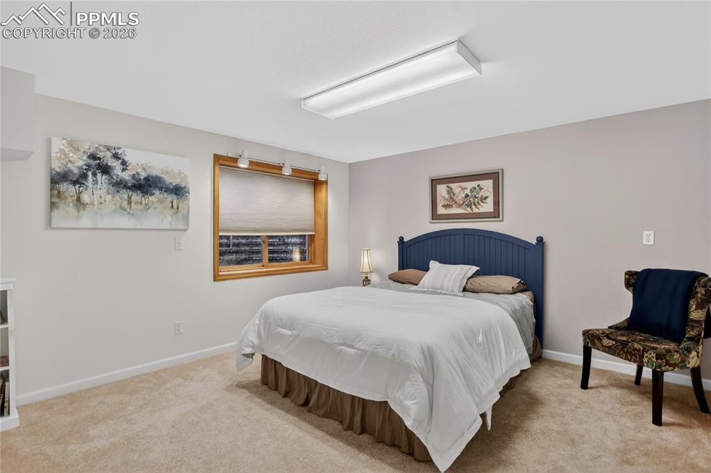 Image 35 of 46: One of multiple sleeping spaces in the en-suite area downstairs.