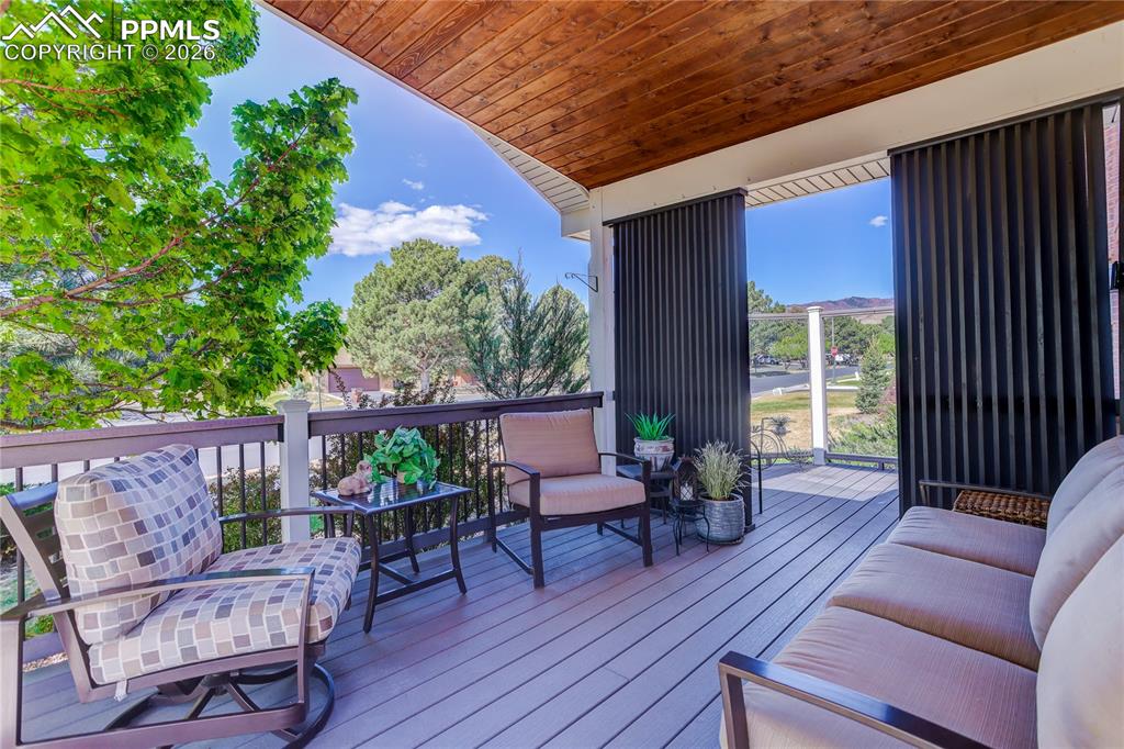 Image 7 of 46: Wonderful outdoor living on this extensive recent covered composite deck w