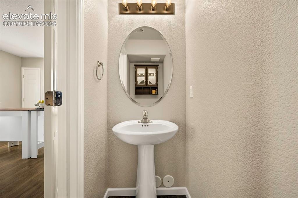 Image 14 of 36: main floor 1/2 bath