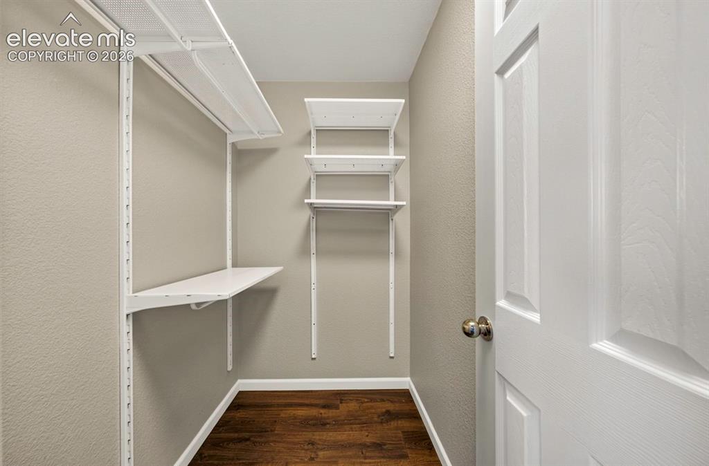 Image 27 of 36: bed 2 walk in closet