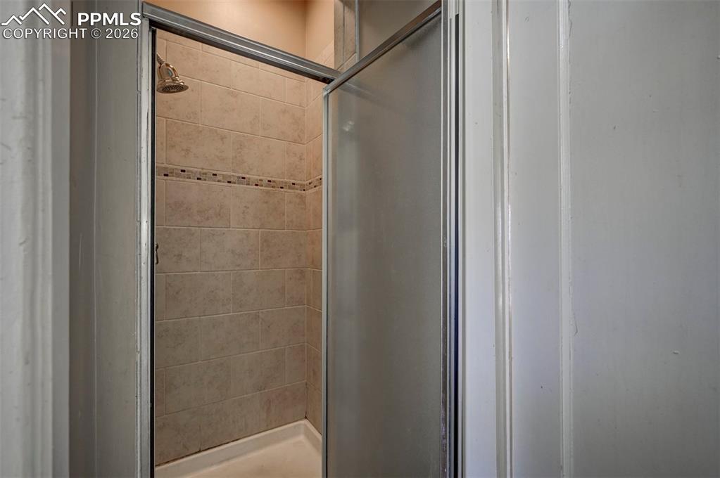 Image 26 of 50: Main bath shower