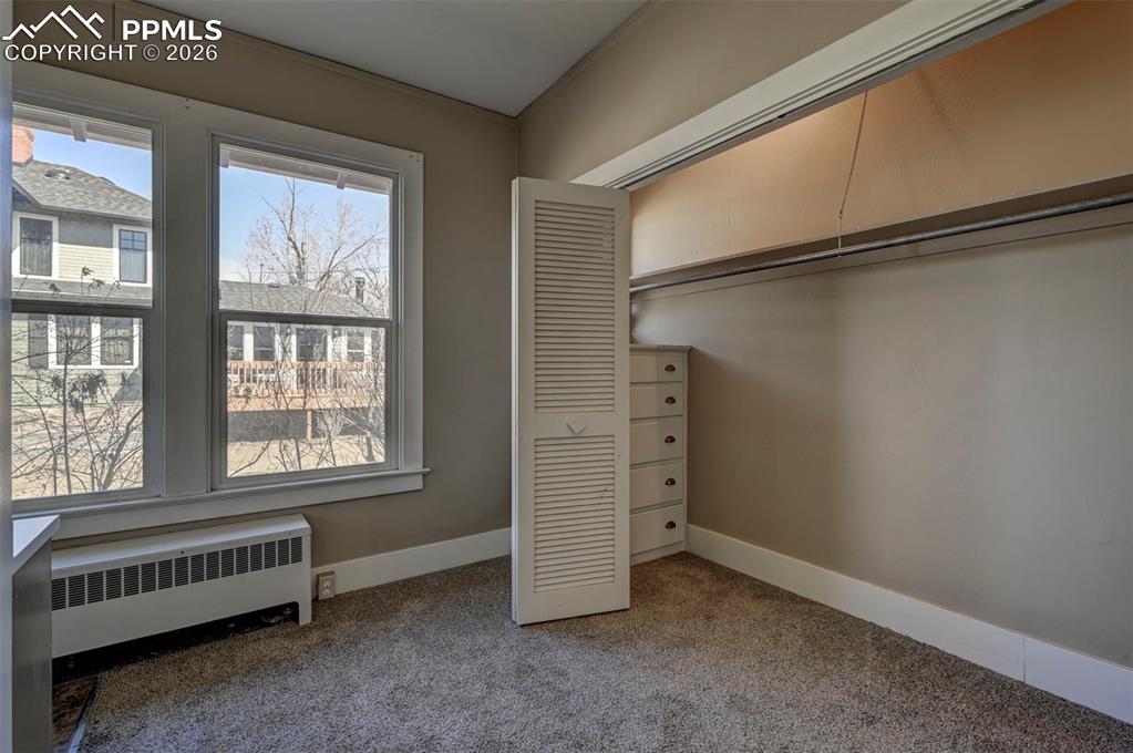 Image 28 of 50: primary closet