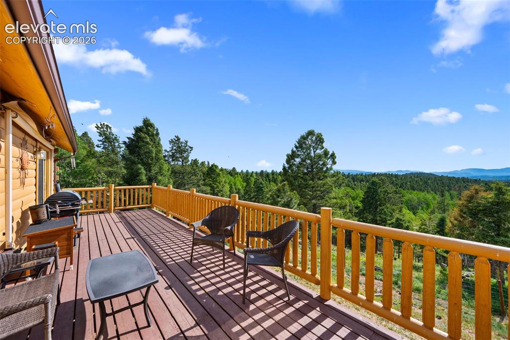 Image 21 of 39: Back deck with amazing views
