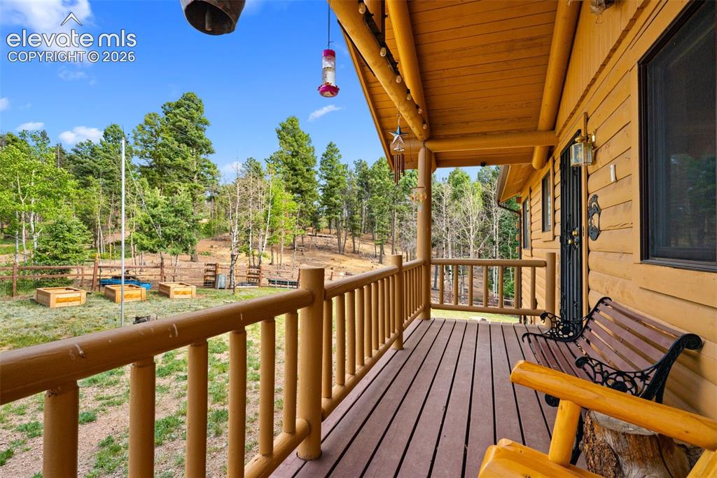 Image 4 of 39: Front deck entrance