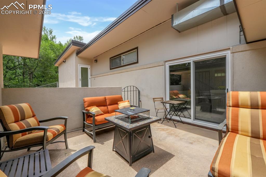 Image 18 of 43: Walk out patio from breakfast nook