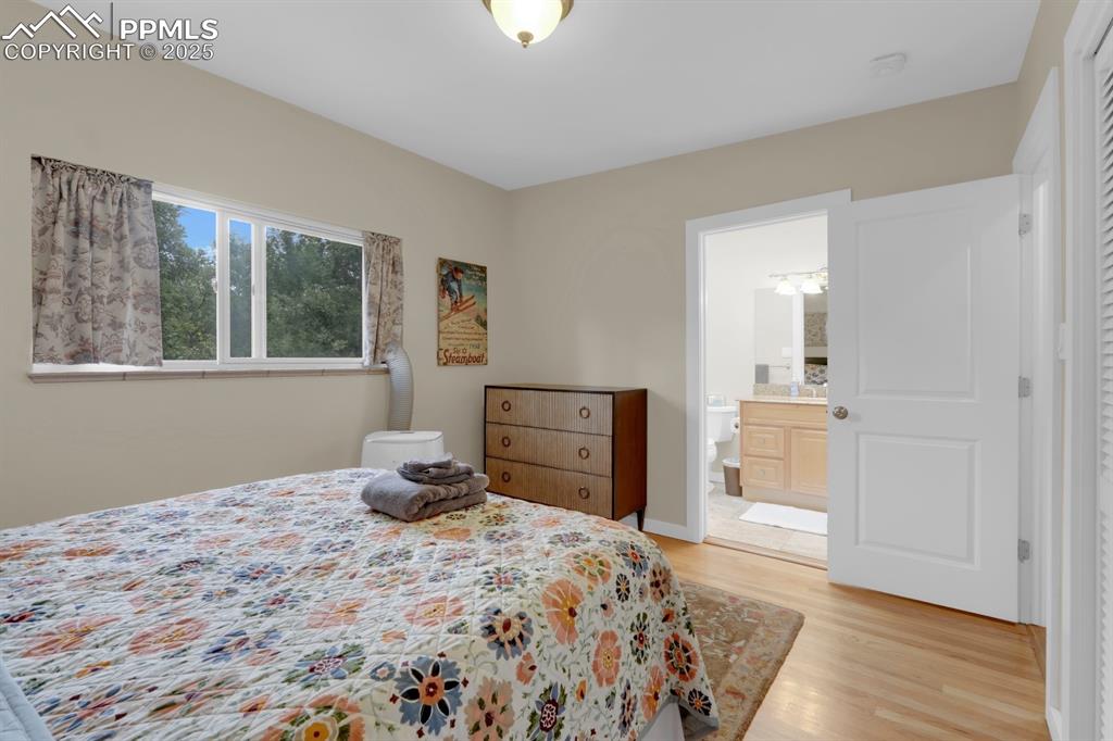 Image 29 of 43: Bedroom 1 with ensuite bathroom