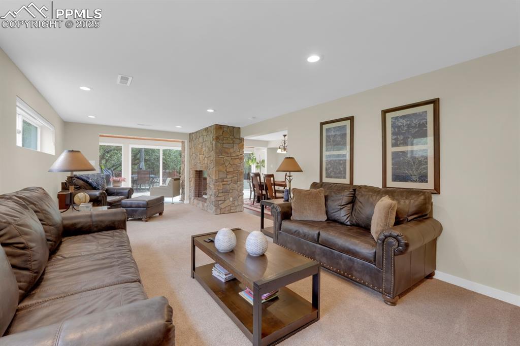 Image 4 of 43: Living area featuring walk out to patio