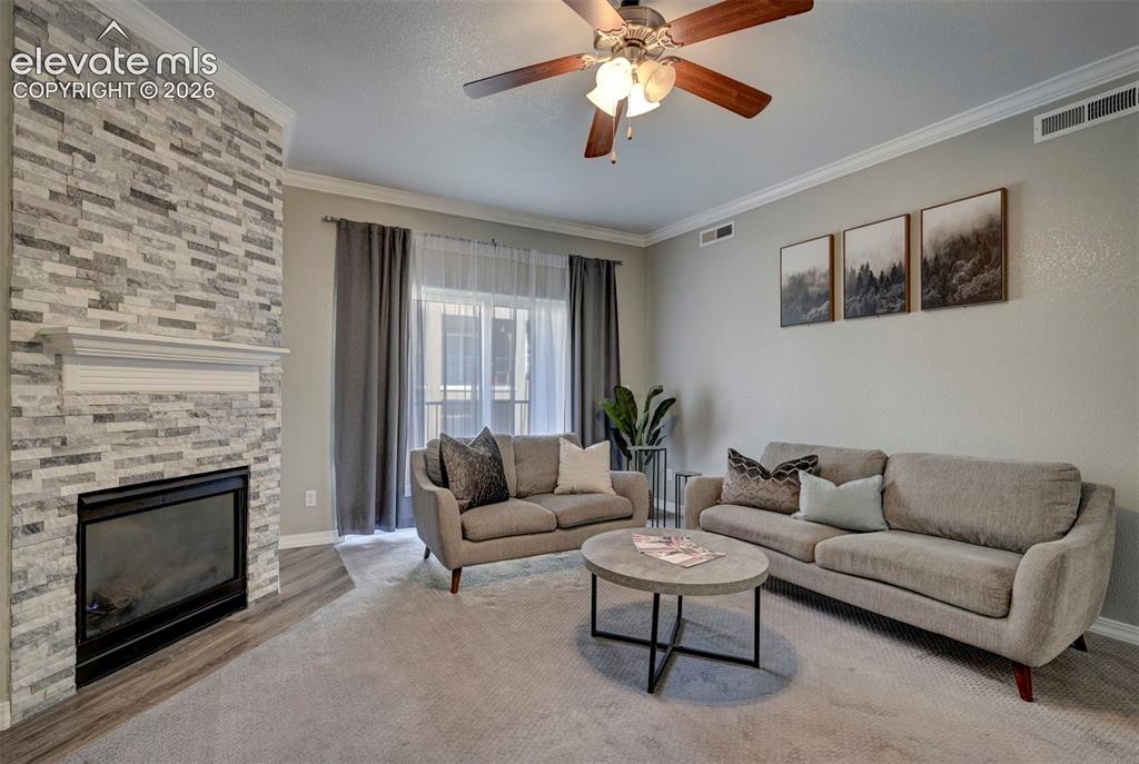 Image 10 of 40: Gas Fireplace and Walkout to private patio