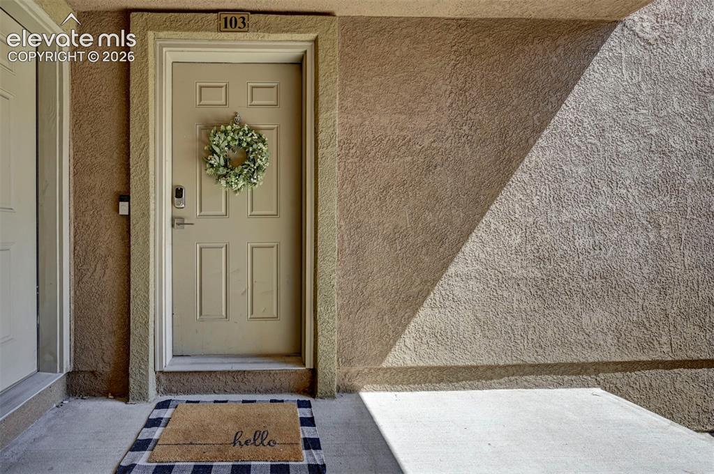 Image 2 of 40: Front door w/ Ring Camera & Keypad