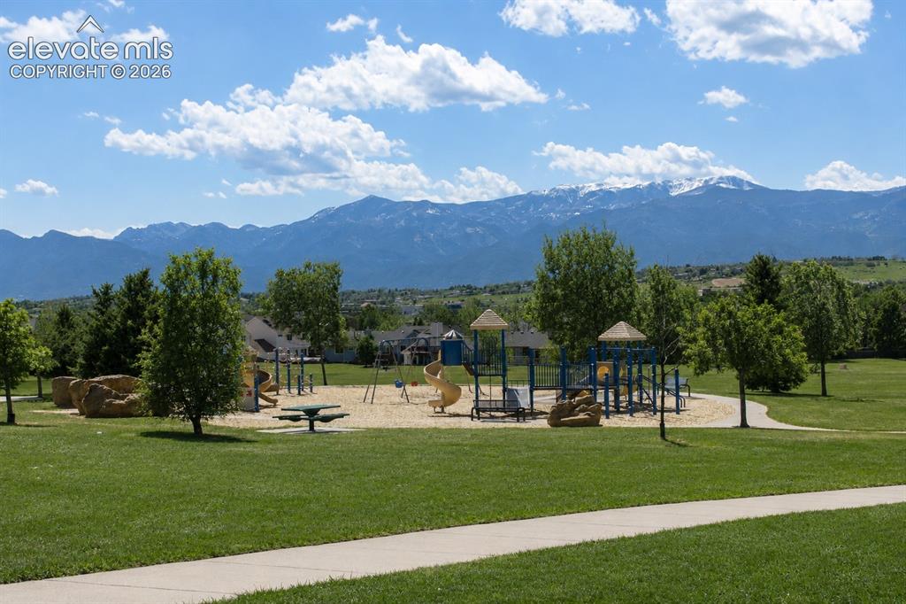 Image 39 of 40: Quick walk to the community Park w/ playground, tennis courts and walking t