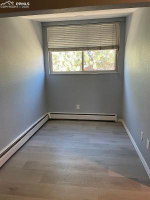 Image 16 of 28: This extra nook in the master bedroom could be a dressing area, sitting are