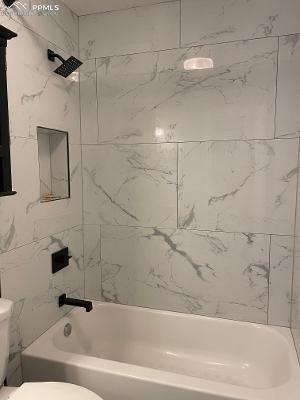 Image 21 of 28: Designer tile!