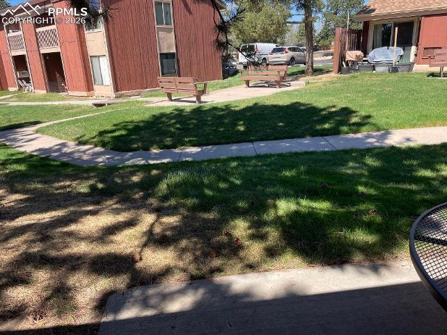 Image 24 of 28: The view from the backyard patio