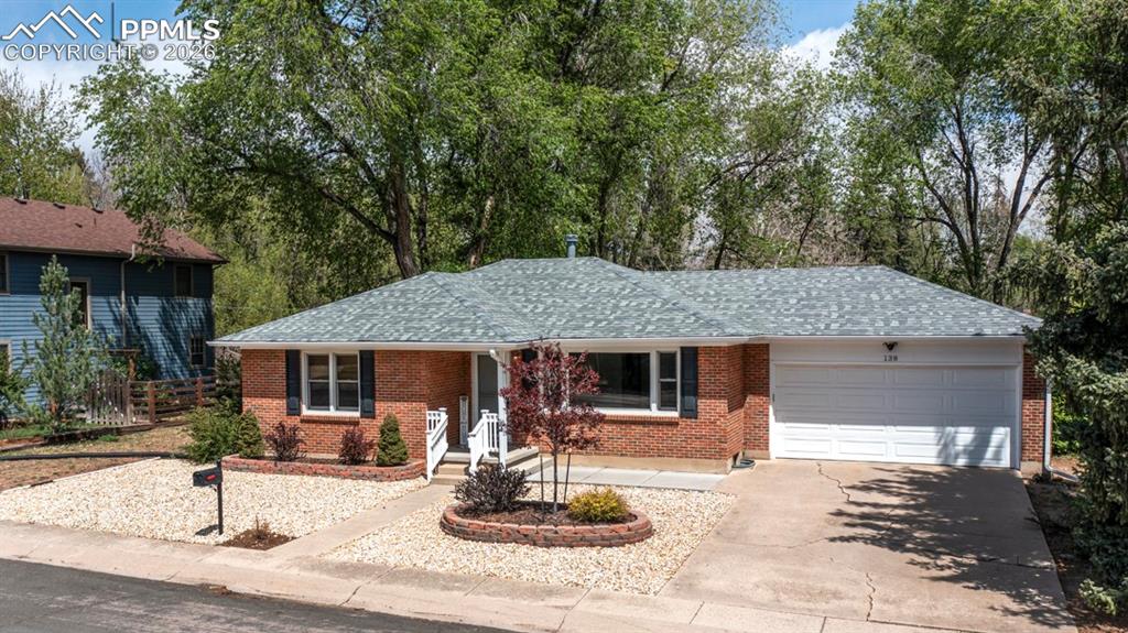 Image 43 of 46: Versatile room with white painted walls, a window for natural light, and a 