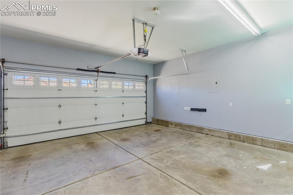 Image 31 of 32: FULLY FINISHED GARAGE