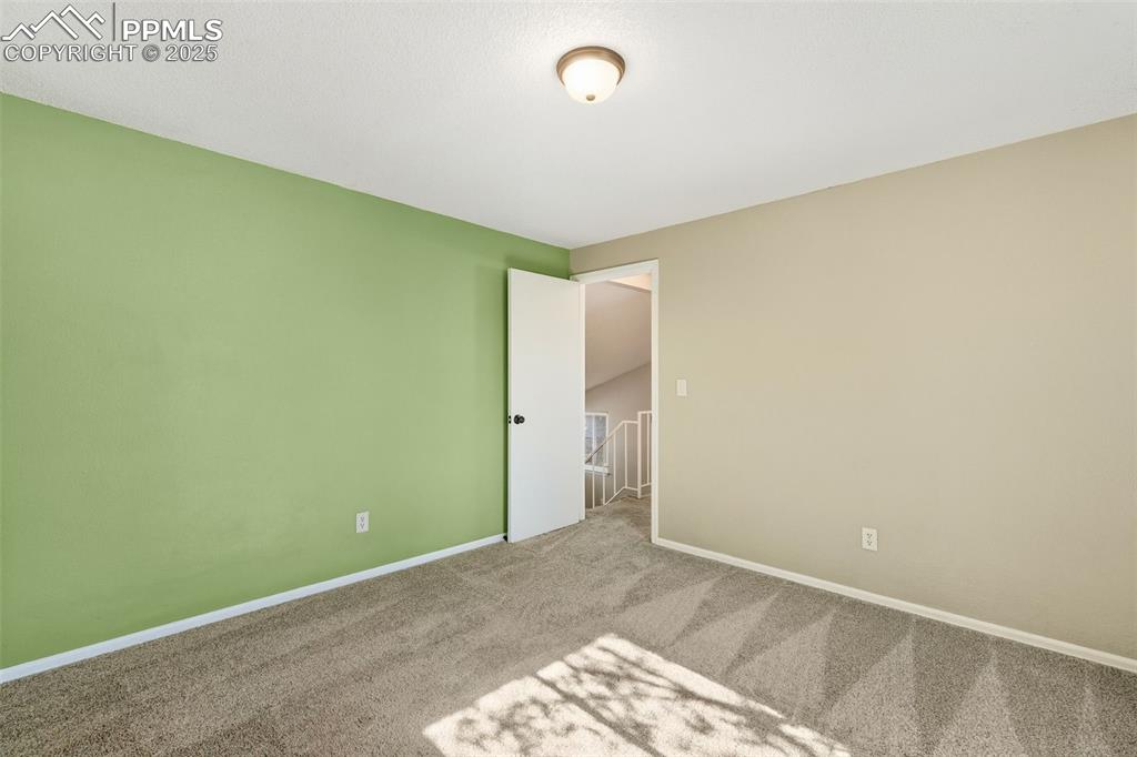 Image 21 of 34: Master Bedroom