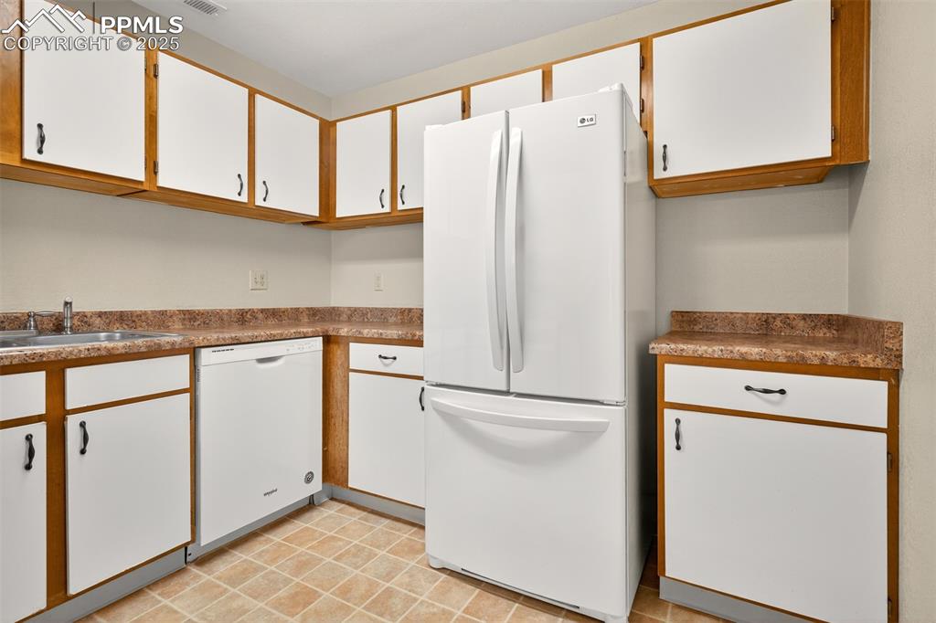 Image 10 of 27: Refrigerator included