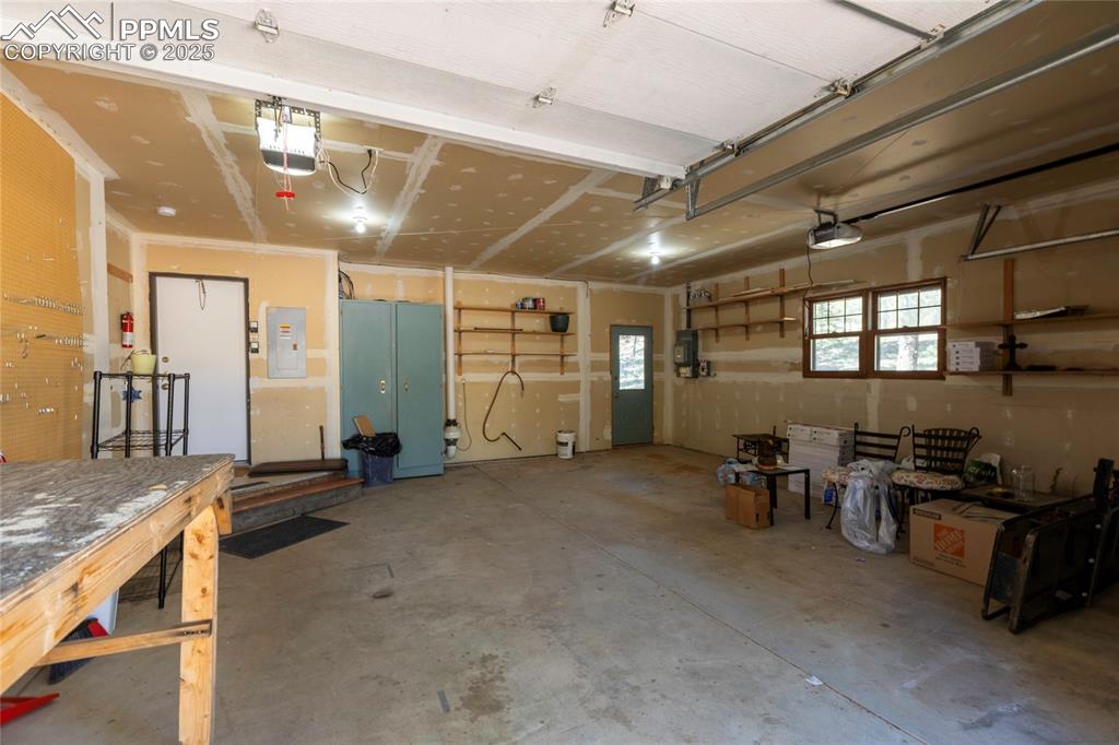 Image 44 of 50: 2 car attached garage with entry to laundry room and kitchen