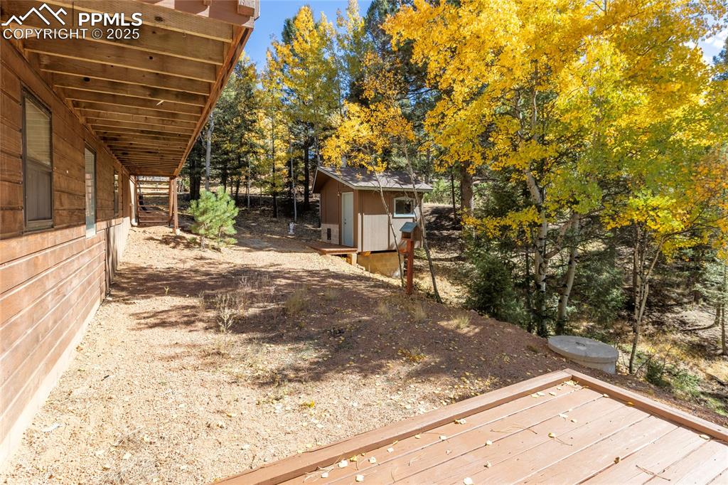 Image 9 of 50: Back yard view from lower deck