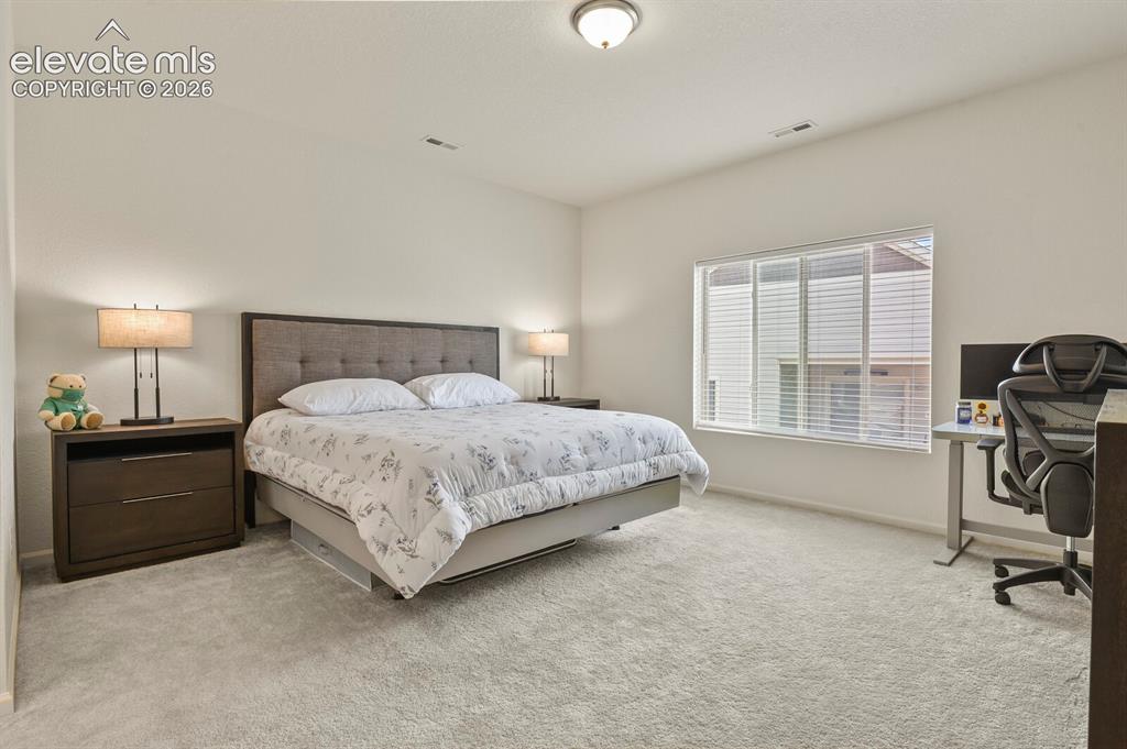 Image 14 of 34: Primary Bedroom