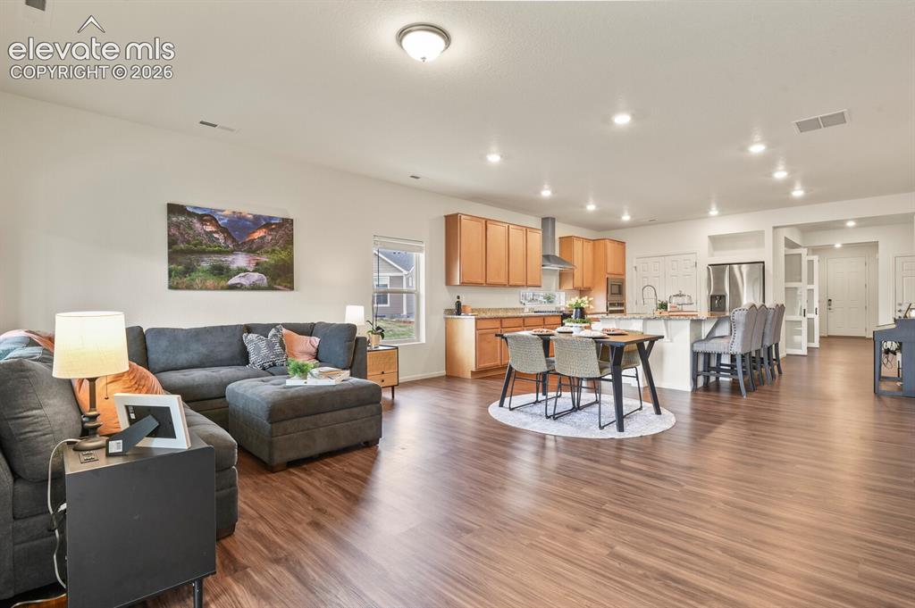 Image 3 of 34: Great room open to kitchen with lots of space