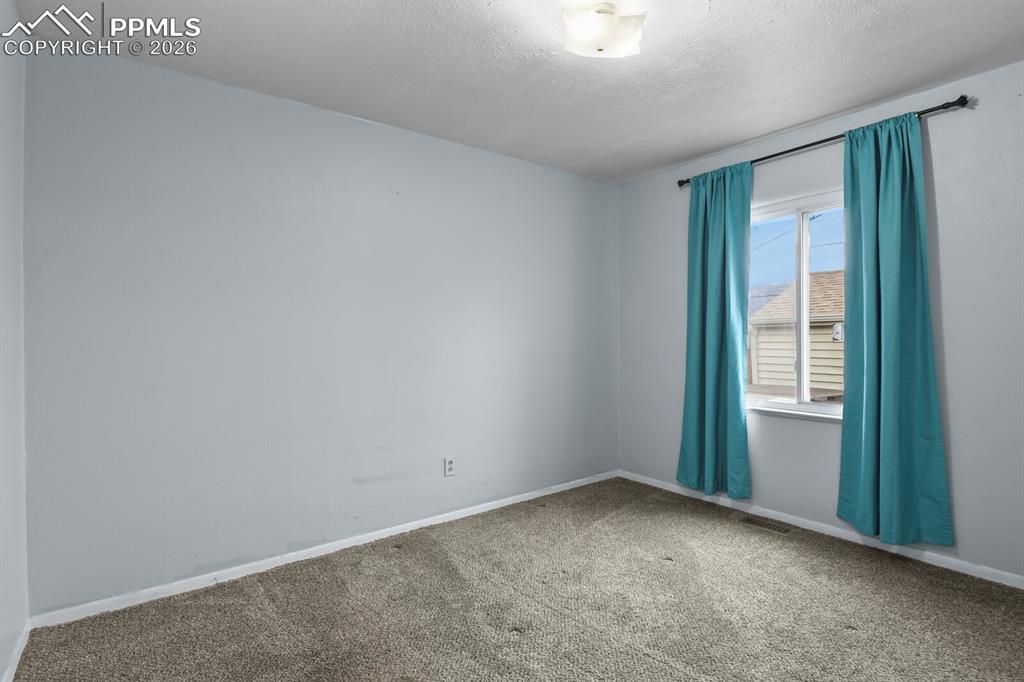 Image 10 of 21: Bedroom