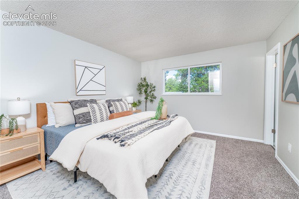 Image 8 of 38: Primary Bedroom 