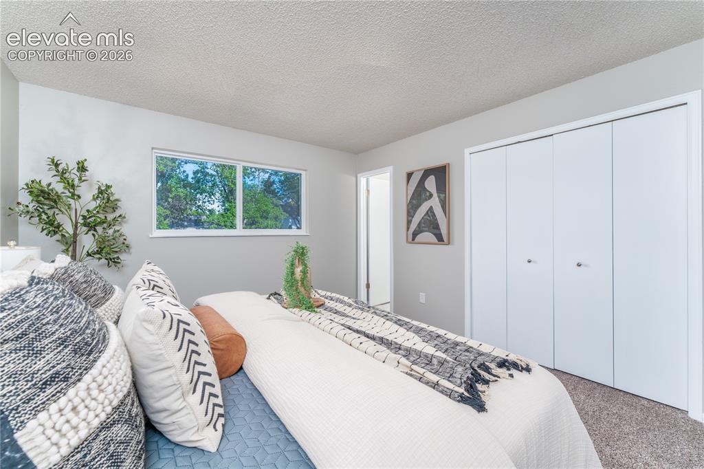 Image 9 of 38: Primary Bedroom 