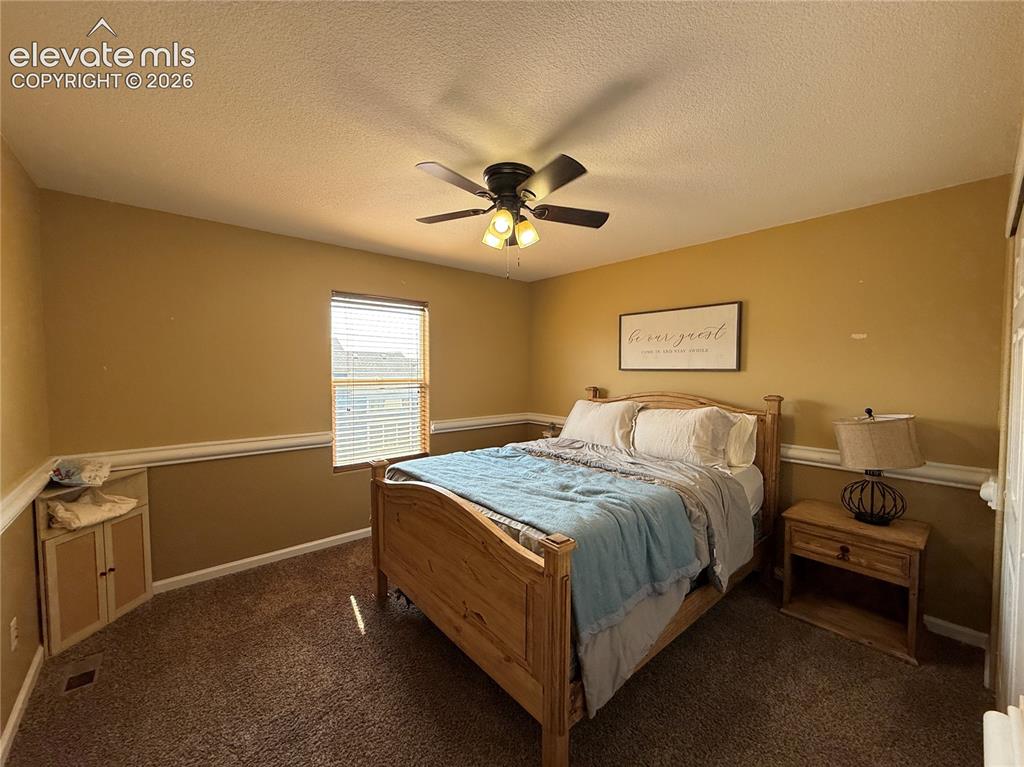 Image 6 of 27: Neutral wall paint with chair rail molding