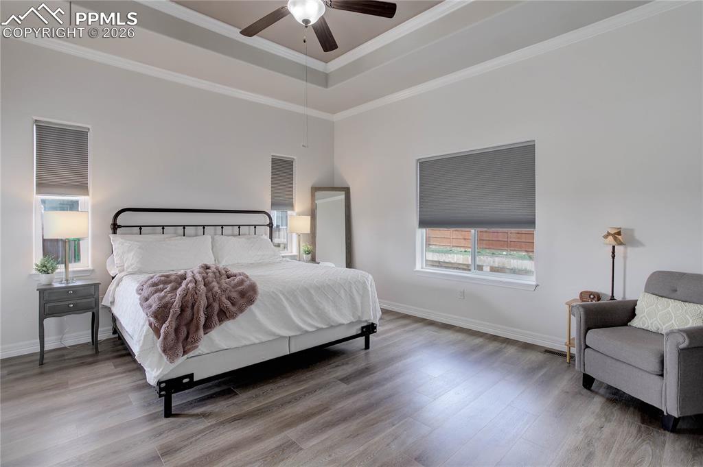 Image 10 of 38: Main level primary suite