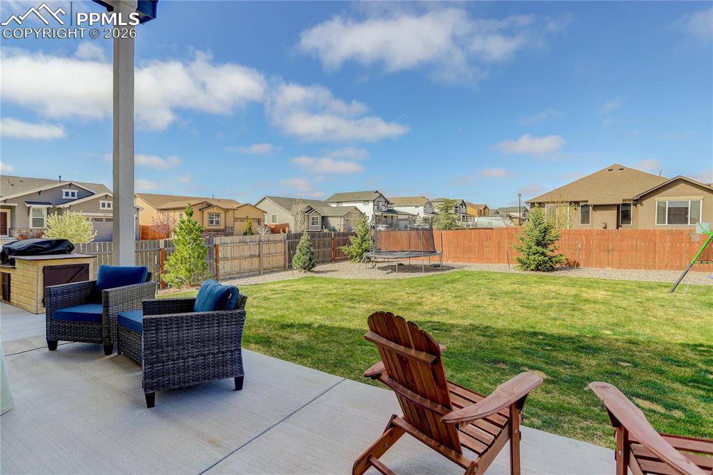 Image 29 of 38: Covered patio