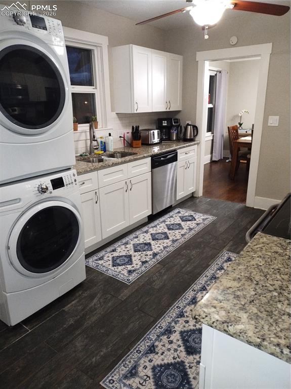 Image 3 of 30: Kitchen with white cabinetry, dark wood-look tile floors, ceiling fan, stai