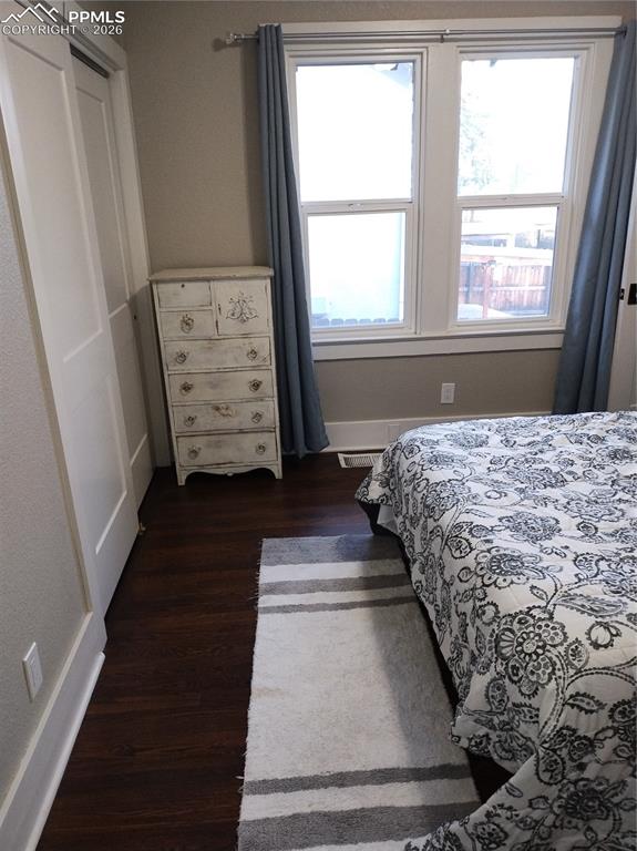 Image 30 of 30: Bedroom #1 upper level with hardwood floors
