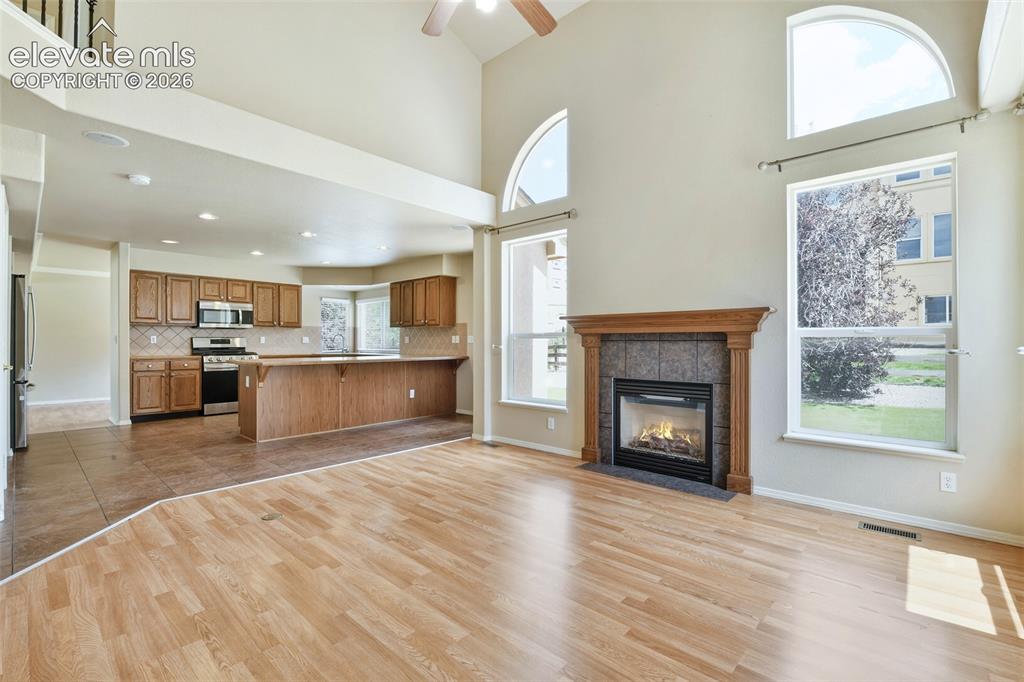 Image 13 of 34: And opens to Vaulted Patio Room