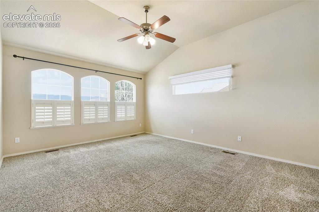 Image 18 of 34: Primary Bedroom has sweeping views of Pikes Peak and Front Range