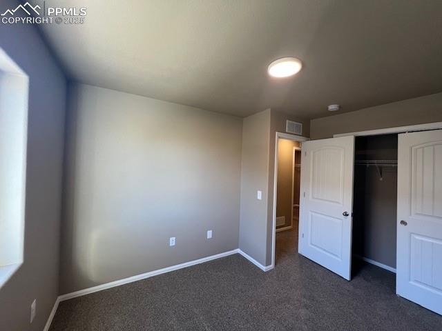 Image 16 of 22: Unfurnished bedroom with a closet
