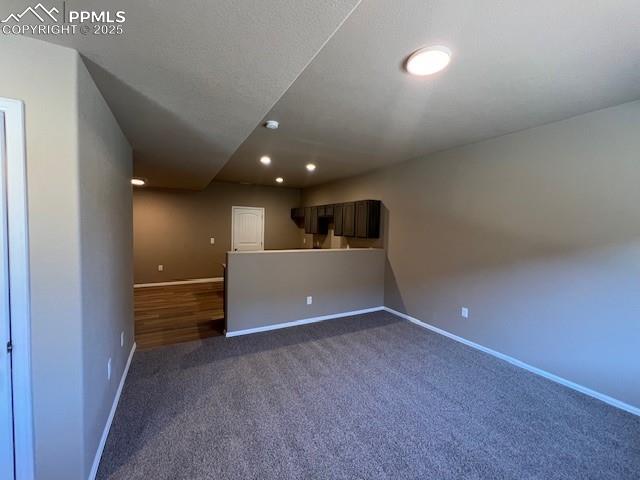 Image 2 of 22: Empty room featuring carpet
