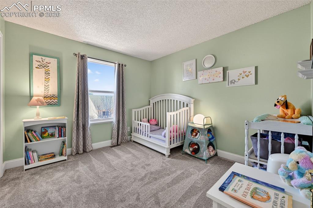 Image 15 of 26: Bedroom