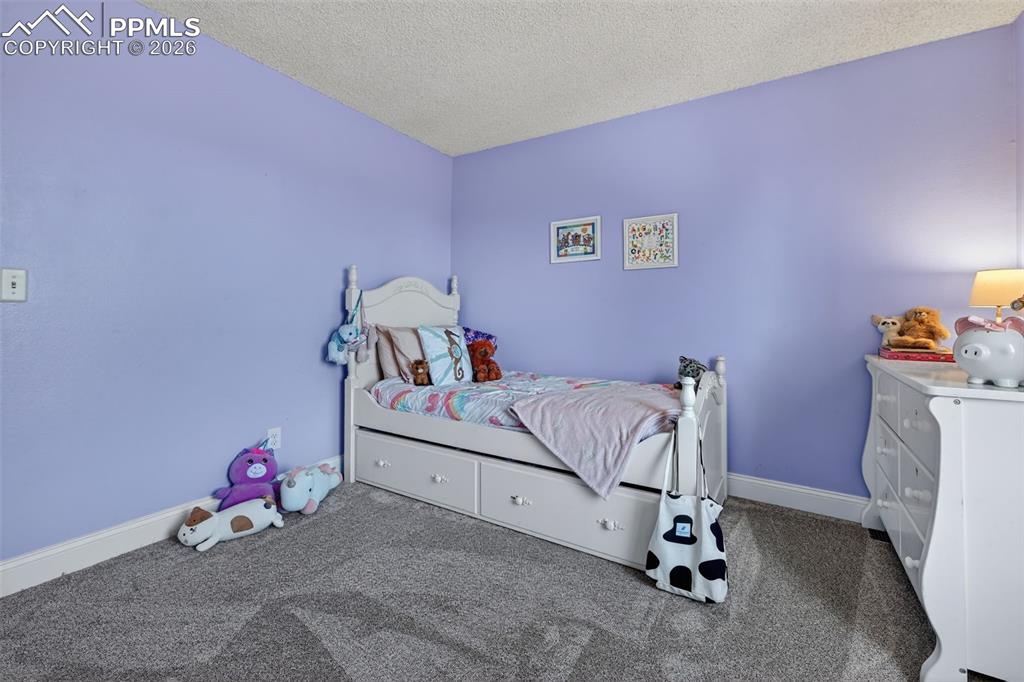 Image 18 of 26: Bedroom