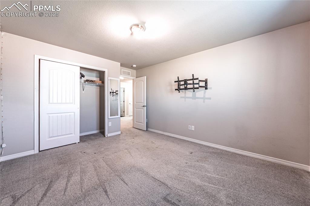 Image 22 of 33: Bedroom