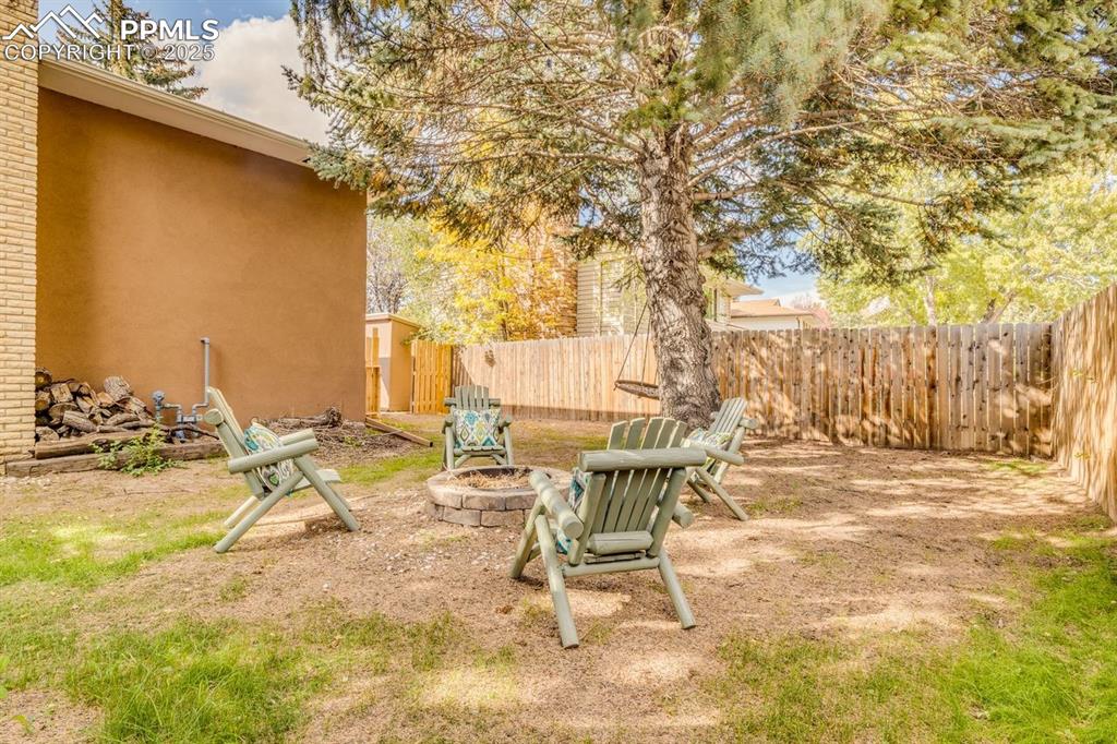 Image 15 of 47: Another view of the backyard.