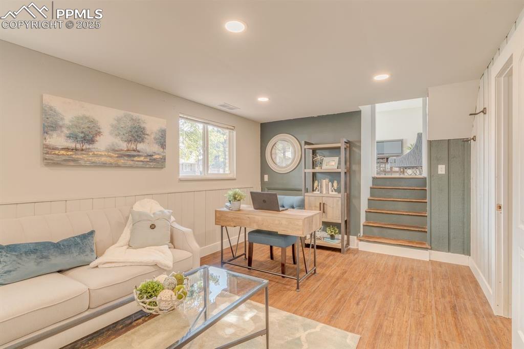 Image 24 of 47: Office area with LVP flooring.