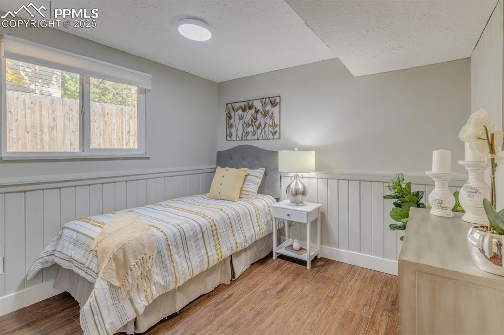 Image 7 of 47: Bedroom in basement.