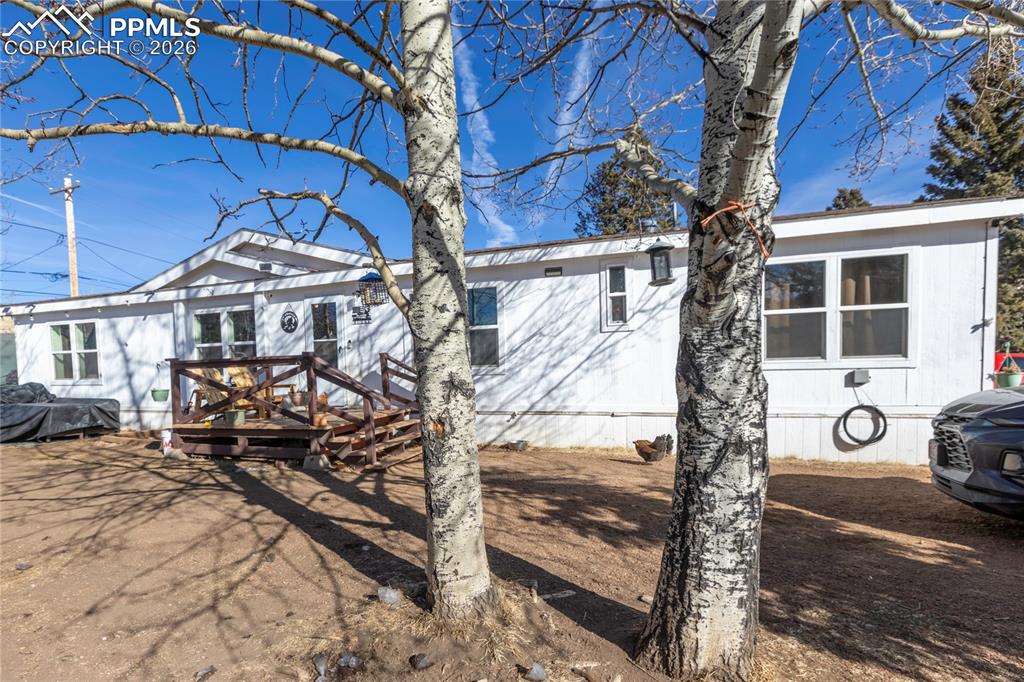 Image 1 of 27: The front of house and the deck!