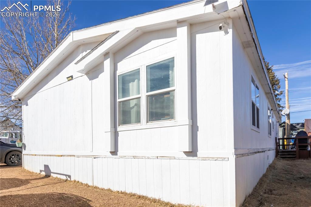 Image 24 of 27: The side of the home!