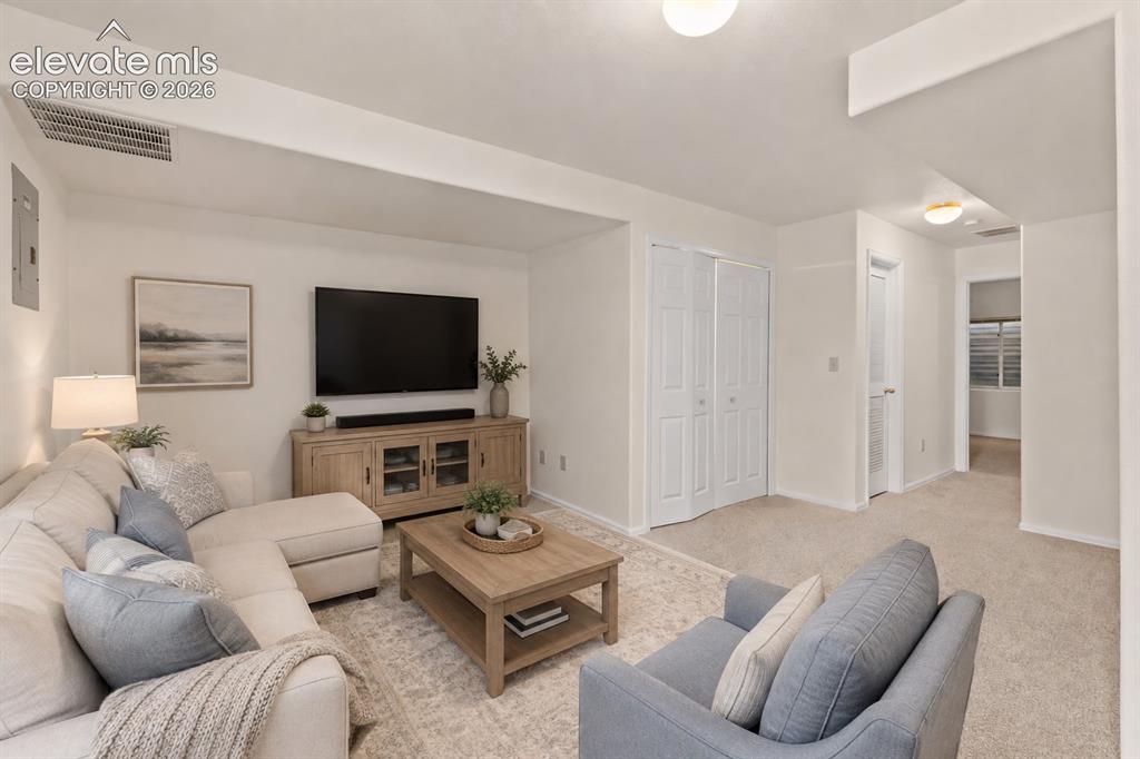 Image 22 of 43: Virtual Staged Basement Family Room