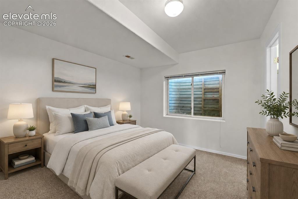 Image 23 of 43: Virtual Staged Basement Bedroom
