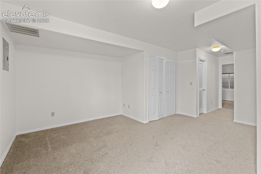 Image 29 of 43: Basement family room