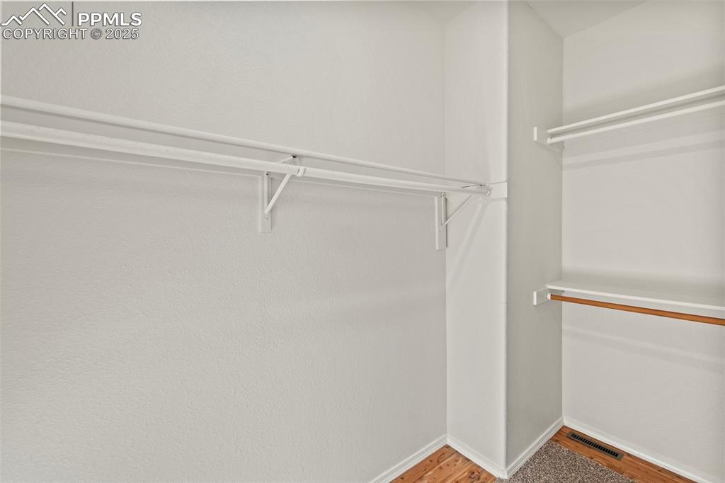 Image 18 of 39: Walk-in Closet